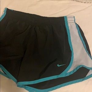 Youth medium blue and white Nike shorts